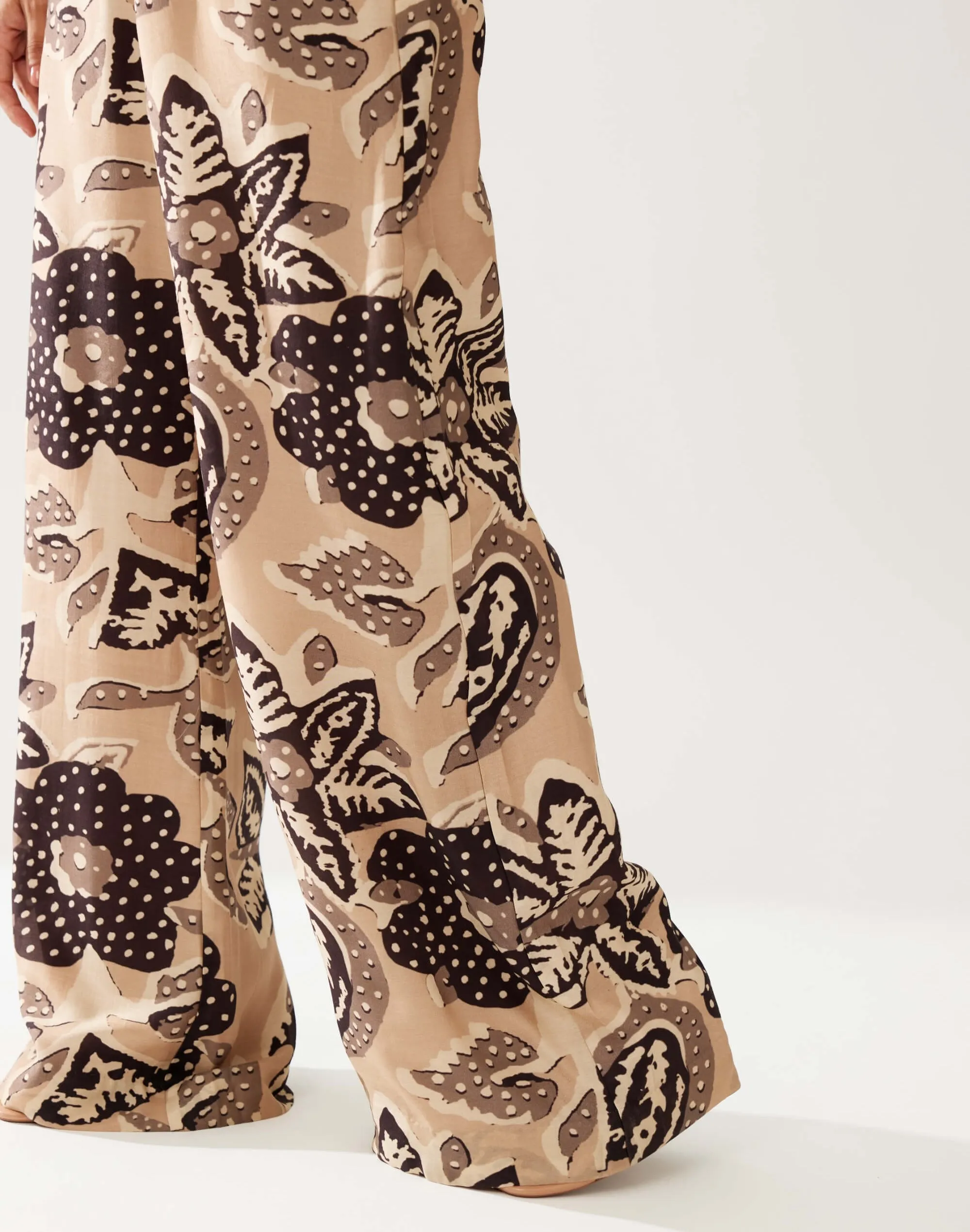 Cream and dark brown floral bow tie jumpsuit